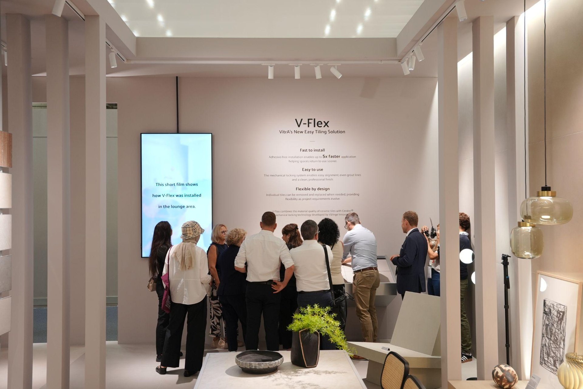 Visitors at the V-Flex installation display: Decoding Surfaces: VitrA Tiles Presents The Code and a New Design Vocabulary at Cersaie
